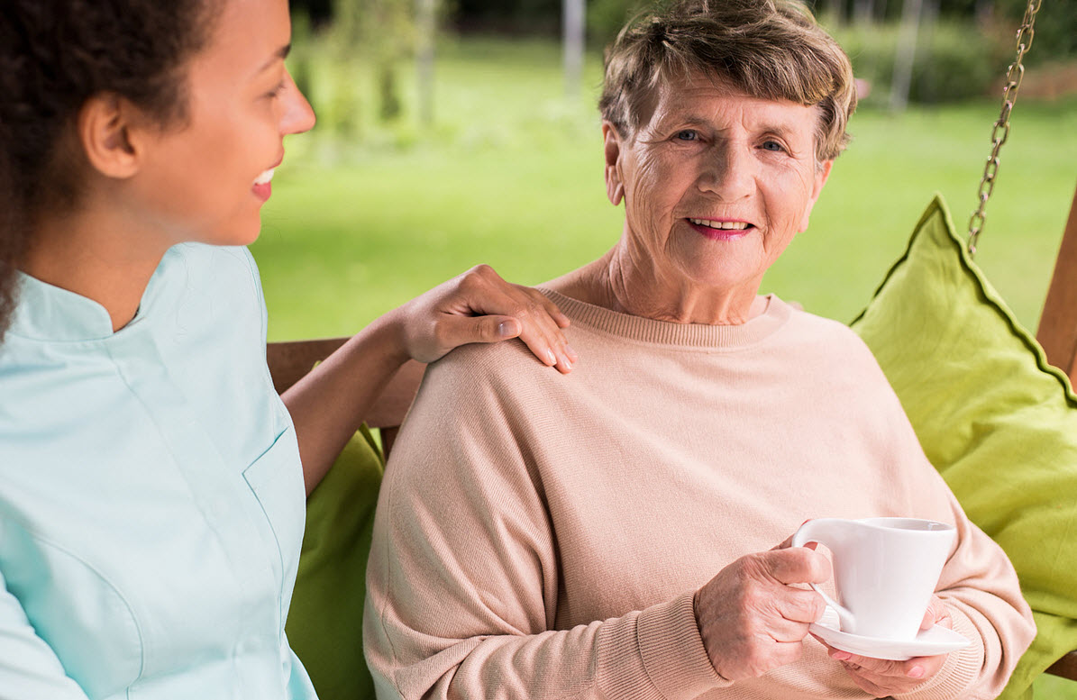 Caregiver helping patient